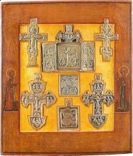 Ikony Siedem mosiężnych ikon wprawionych w deskę